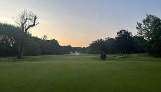 Langley Park Golf Club greenkeepers at work on a morning