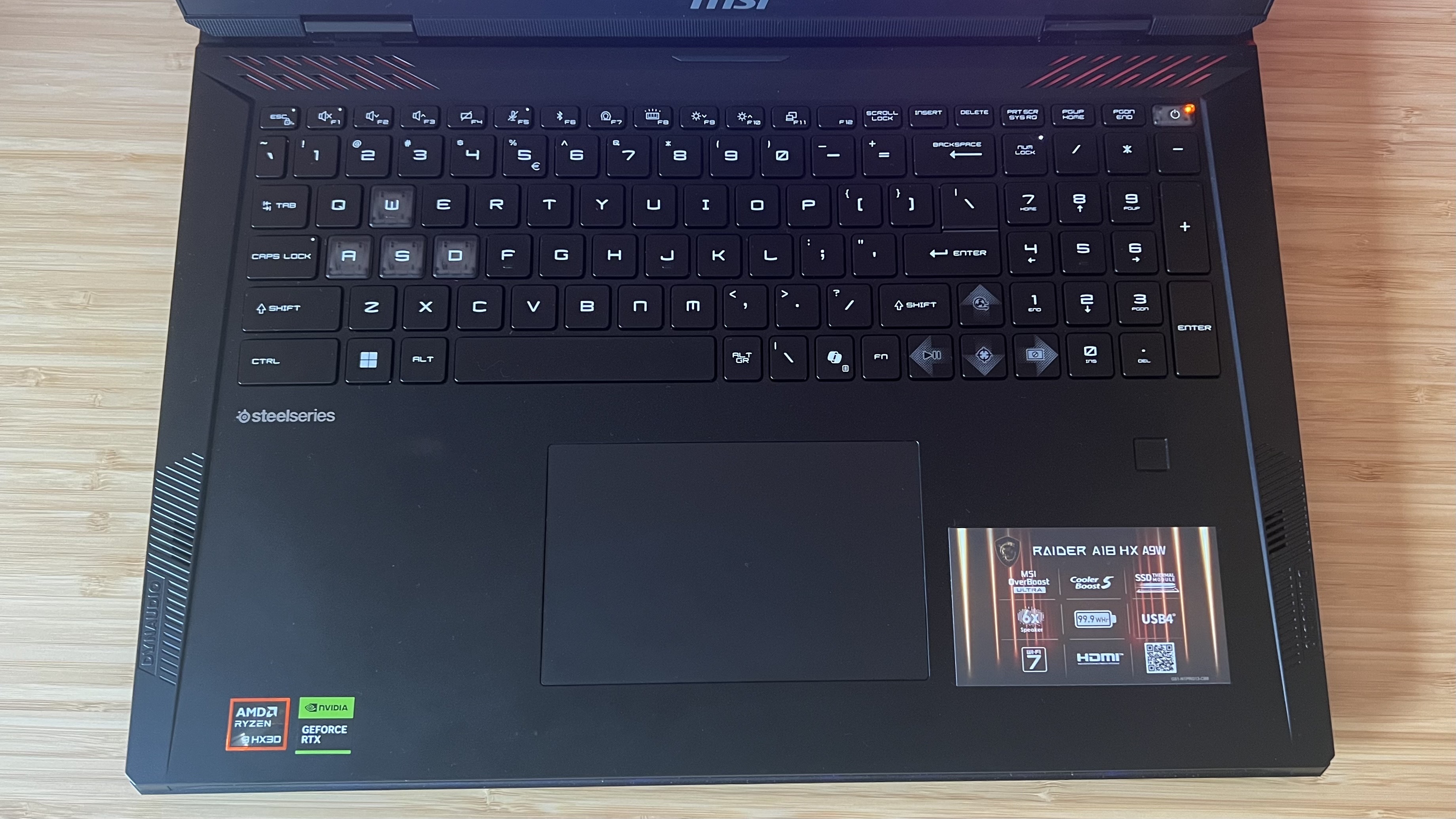 Top down view of keyboard and trackpad on MSI Raider A18 HX gaming laptop