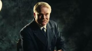 Philip Seymour Hoffman getting his picture taken in The Master