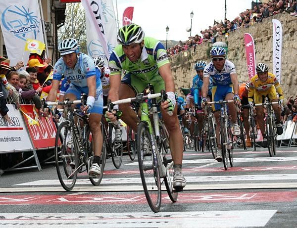 Michael Albasini and David Rebellin come up in fifth and sixth.