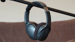 The Skullcandy Crusher 540 Active on a sofa.