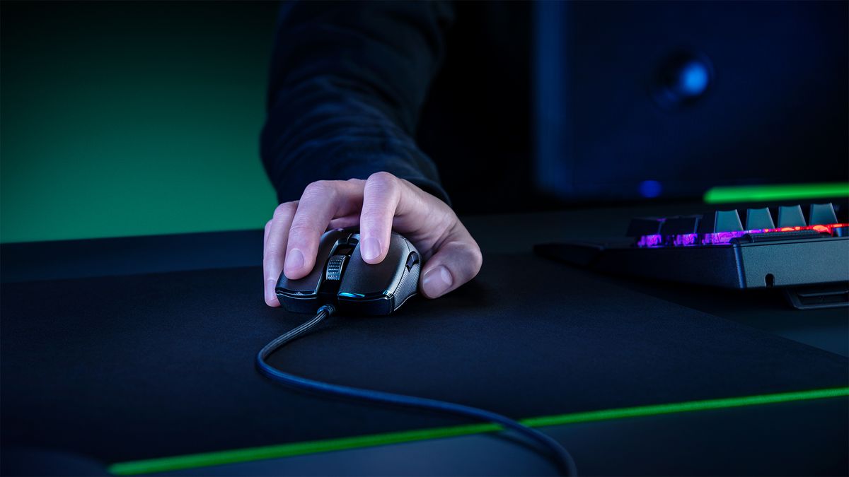 Razer Viper 8K gaming mouse being used on a Razer RGB mousepad