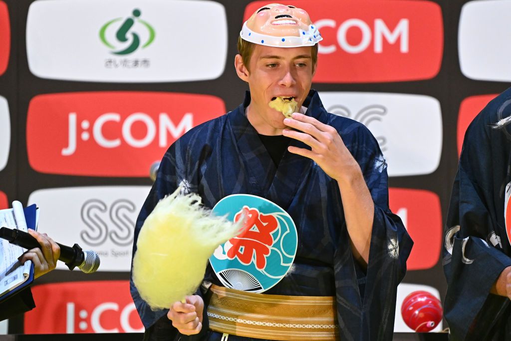 SAITAMA JAPAN NOVEMBER 05 Jonas Vingegaard Rasmussen of Denmark and Team Jumbo Visma Yellow Leader Jersey makes cotton candy and participates in a Quiz Contest at Thematic Japanese Festival during the 8th Tour de France Saitama Criterium 2022 Media Day SaitamaCriterium on November 05 2022 in Saitama Japan Photo by Kenta HaradaGetty Images
