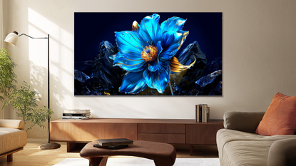 TCL C7K in living room hanging on wall