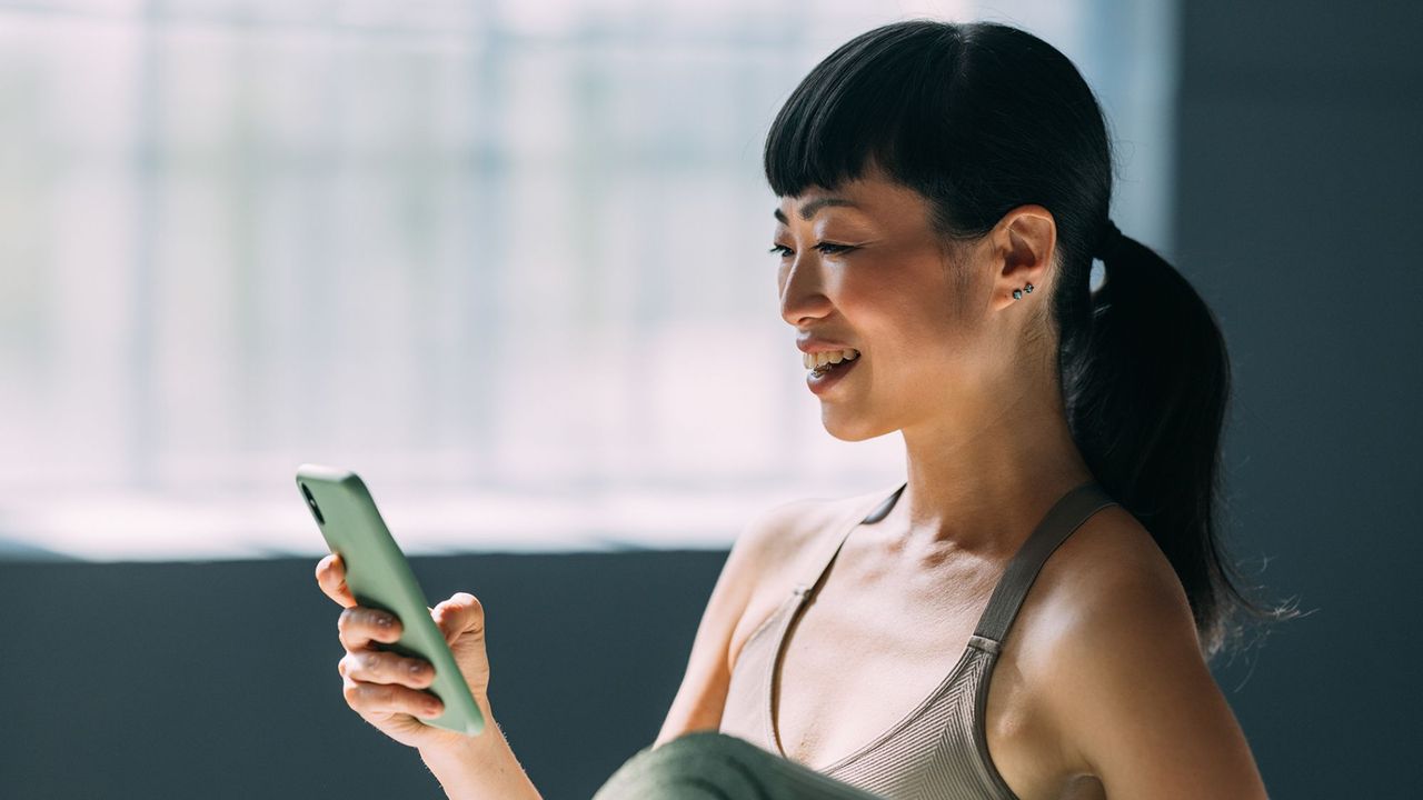 A woman checking her smartphone