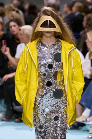 The Spring 2025 Color Combination Trends of yellow and silver at Prada's Spring 2025 show