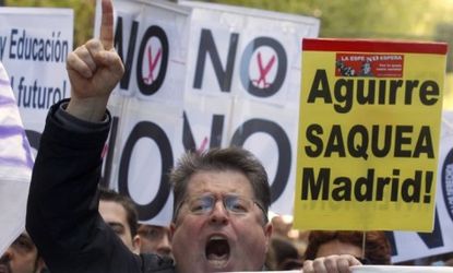 Protesters demonstrate against spending cuts in Madrid: Spain's economy, the EU's fourth largest, is in increasingly dire straits.
