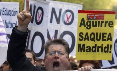 Protesters demonstrate against spending cuts in Madrid: Spain&amp;#039;s economy, the EU&amp;#039;s fourth largest, is in increasingly dire straits.