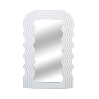 A mirror with a white wavy frame