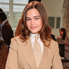 Sarah Catherine Hook wearing a Ralph Lauren blazer and tie