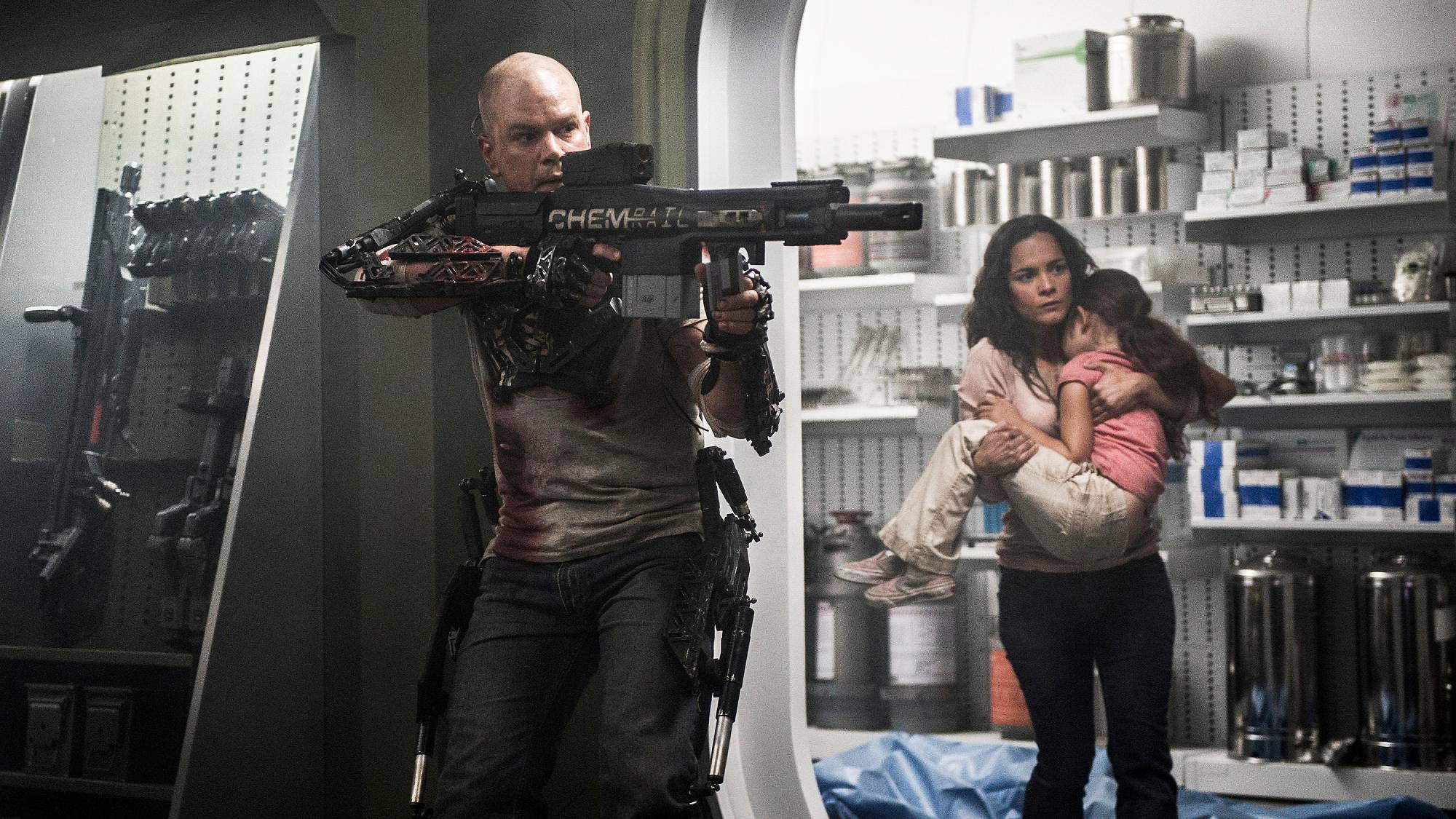 Matt Damon as Max and Alice Braga as Frey in &quot;Elysium&quot; movie (2013)