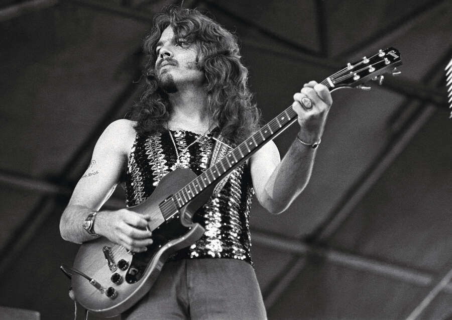 Tom Johnston of Doobie Brothers performing on stage, Knebworth, United Kingdom, 1974.