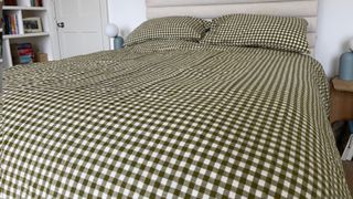 The end view of the Piglet In Bed Gingham Bedding