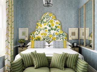 Kit Kemp bedroom with headboard in Fanny Shorter's Margo fabric