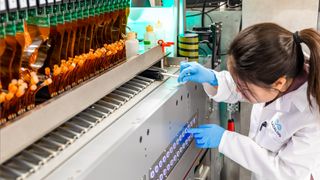 CATALOG head of molecular biology Tracy Kambara prepares Shannon, the first commercially viable automated DNA storage and computation platform for enterprise use