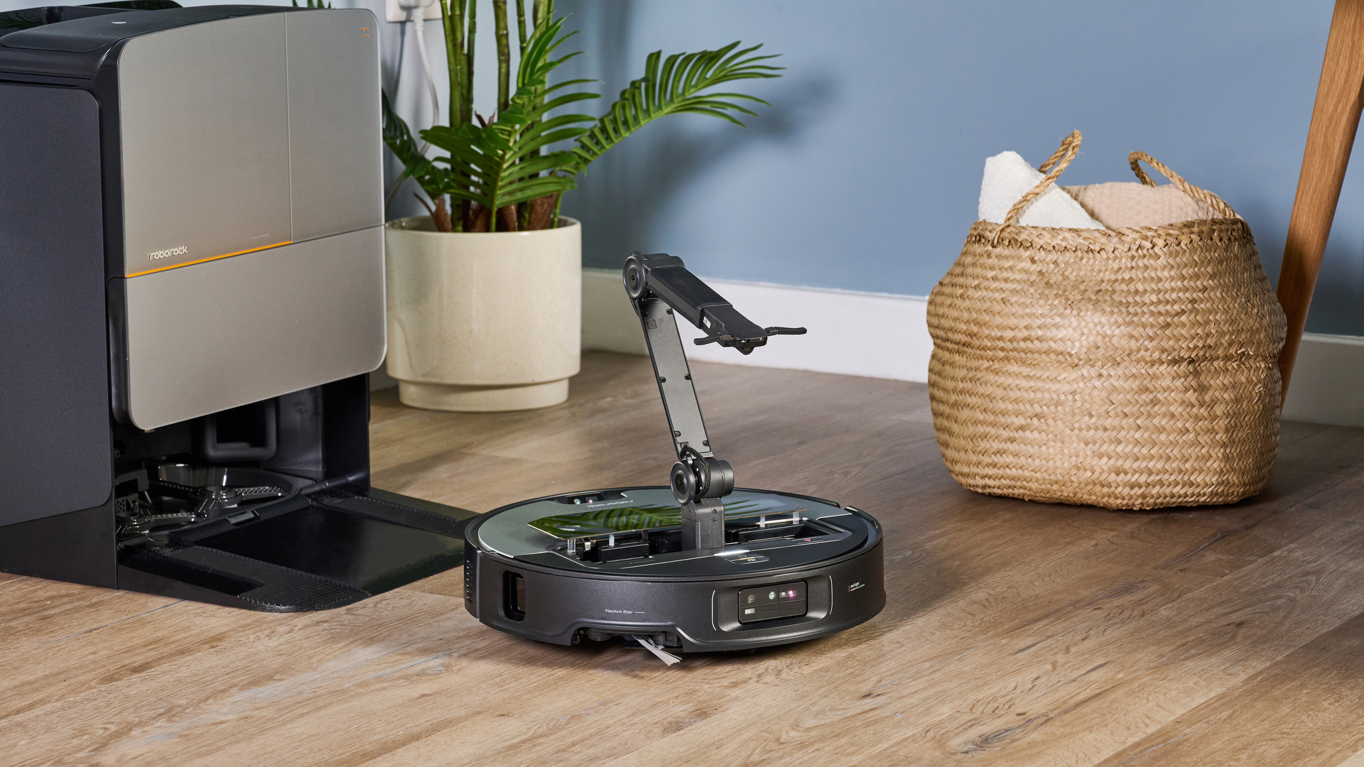 Roborock Saros Z70 robot vacuum with its arm out