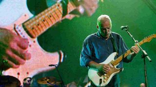 David Gilmour performing onstage in 2004