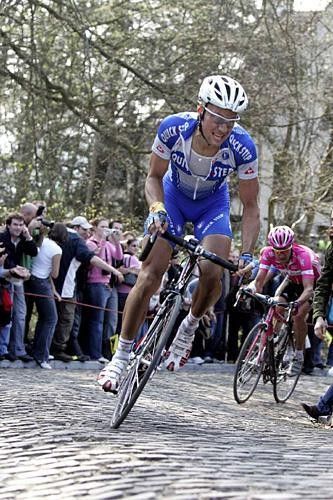 Tom Boonen (Quick.Step) puts the boot into Klier on the Muur