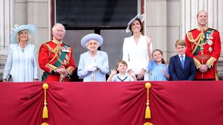 Queen Elizabeth II smiles on the balcony of Buckingham Palace during Trooping the Colour alongside (L-R) Camilla, Duchess of Cornwall, Prince Charles, Prince of Wales, Prince Louis of Cambridge, Catherine, Duchess of Cambridge and Prince Charlotte of Cambridge during Trooping The Colour