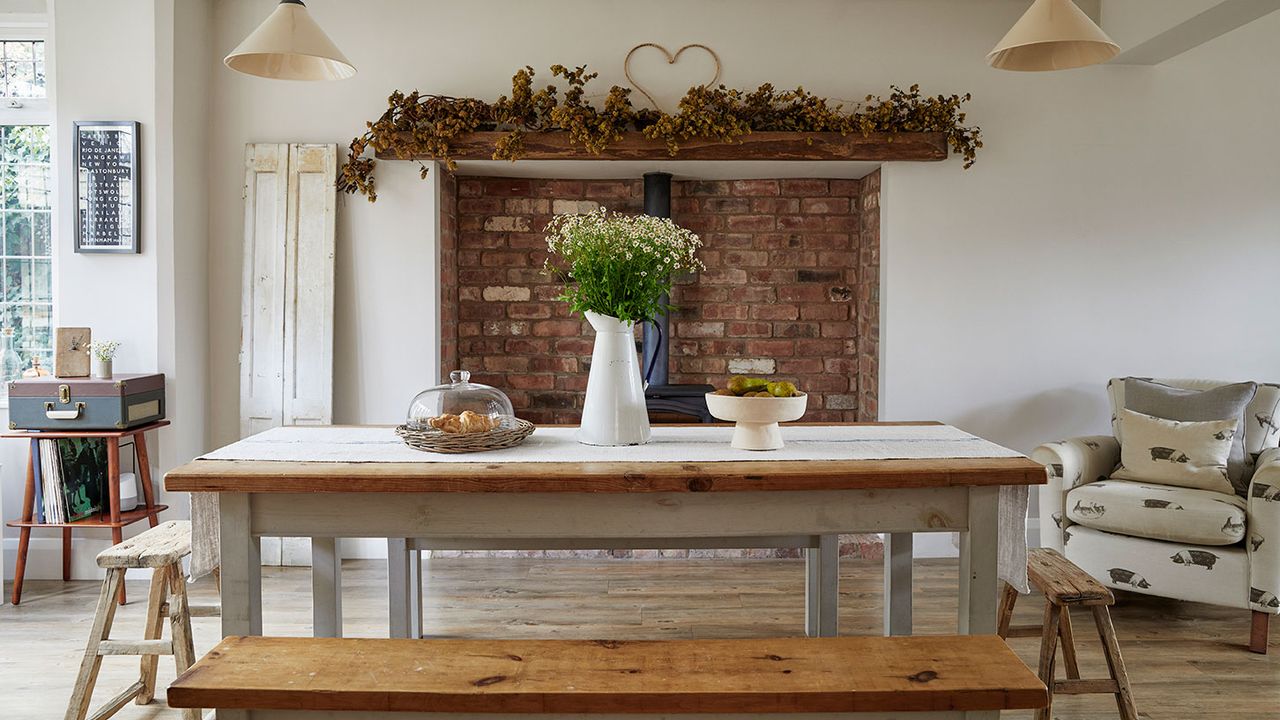 Rustic style dining area with large table and bench seats