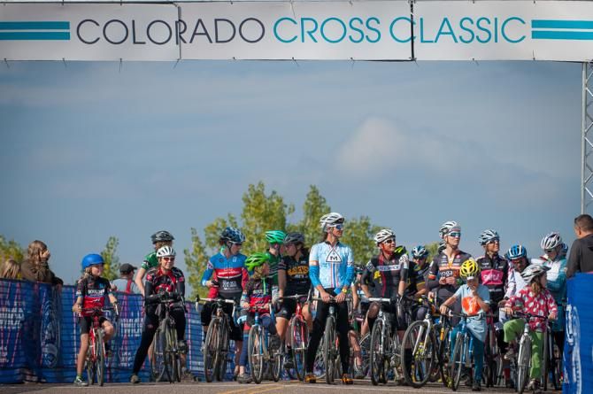 Riders line up before the start of the silent lap in memory of Amy Dombroski, who was killed during a training accident in Belgium last week. Colorado Cross Classic.