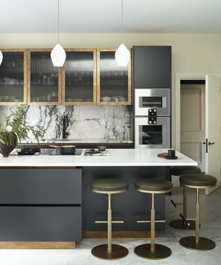 Dark grey kitchen with gold details