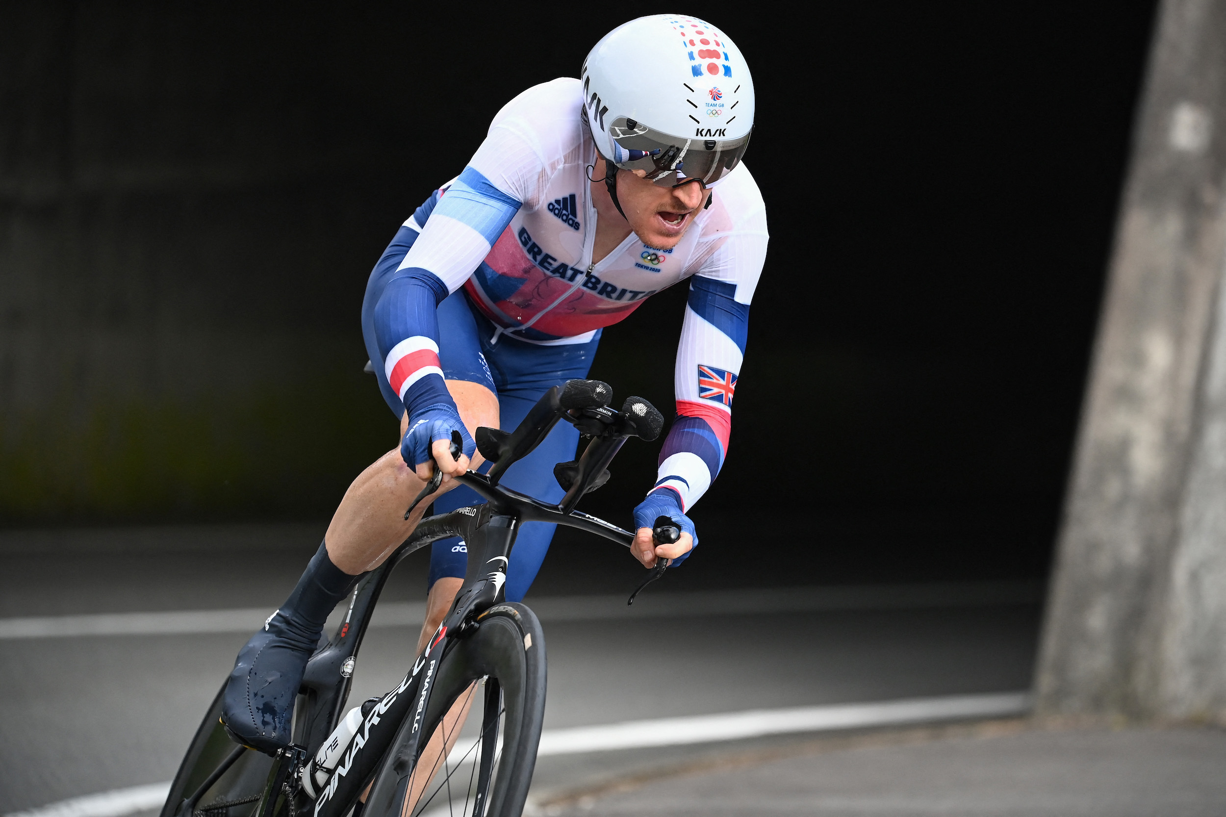 Geraint Thomas riding to 12th place in the Tokyo 2020 Olympic Games individual time trial