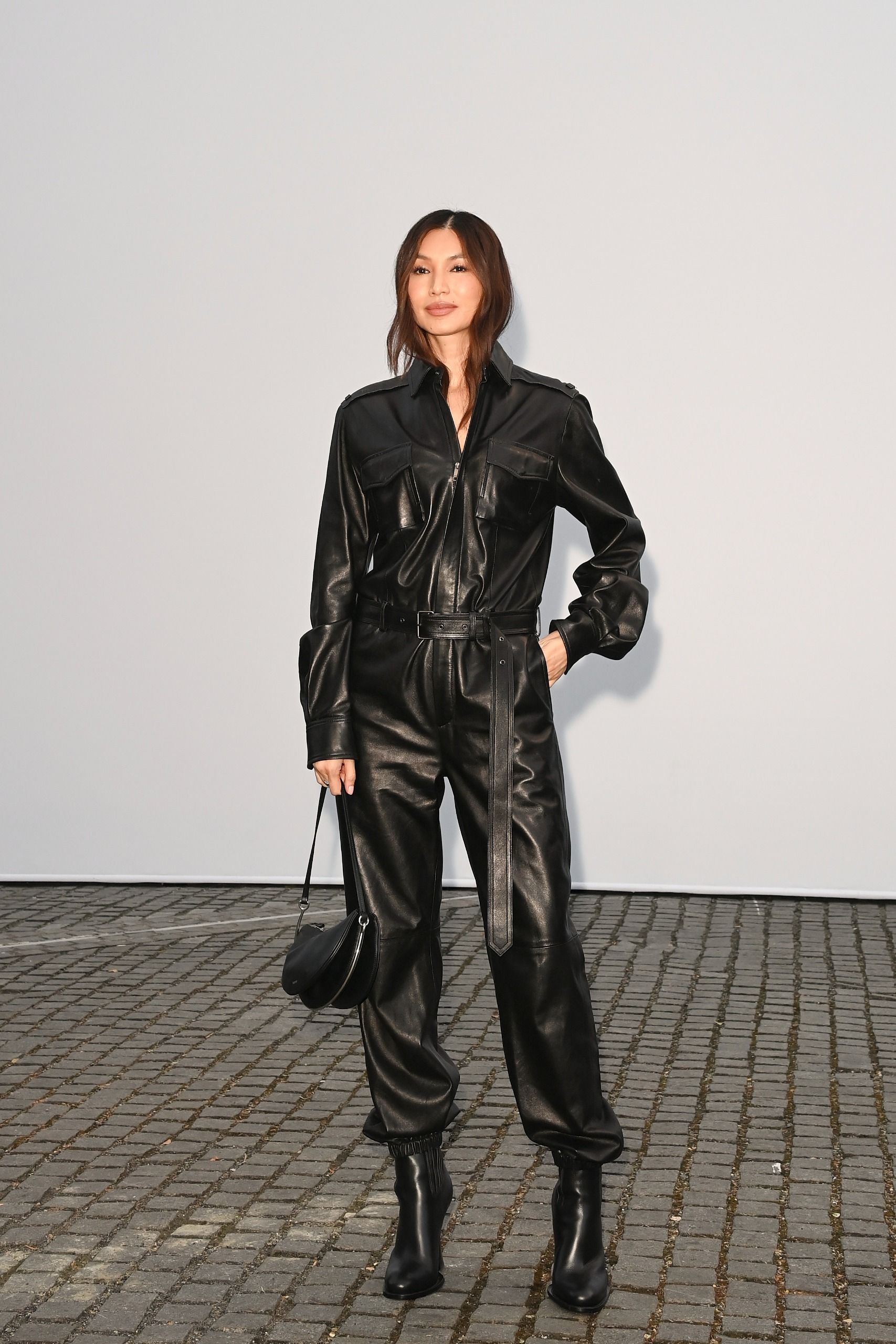 An image of celebrities arriving at the Burberry front row.