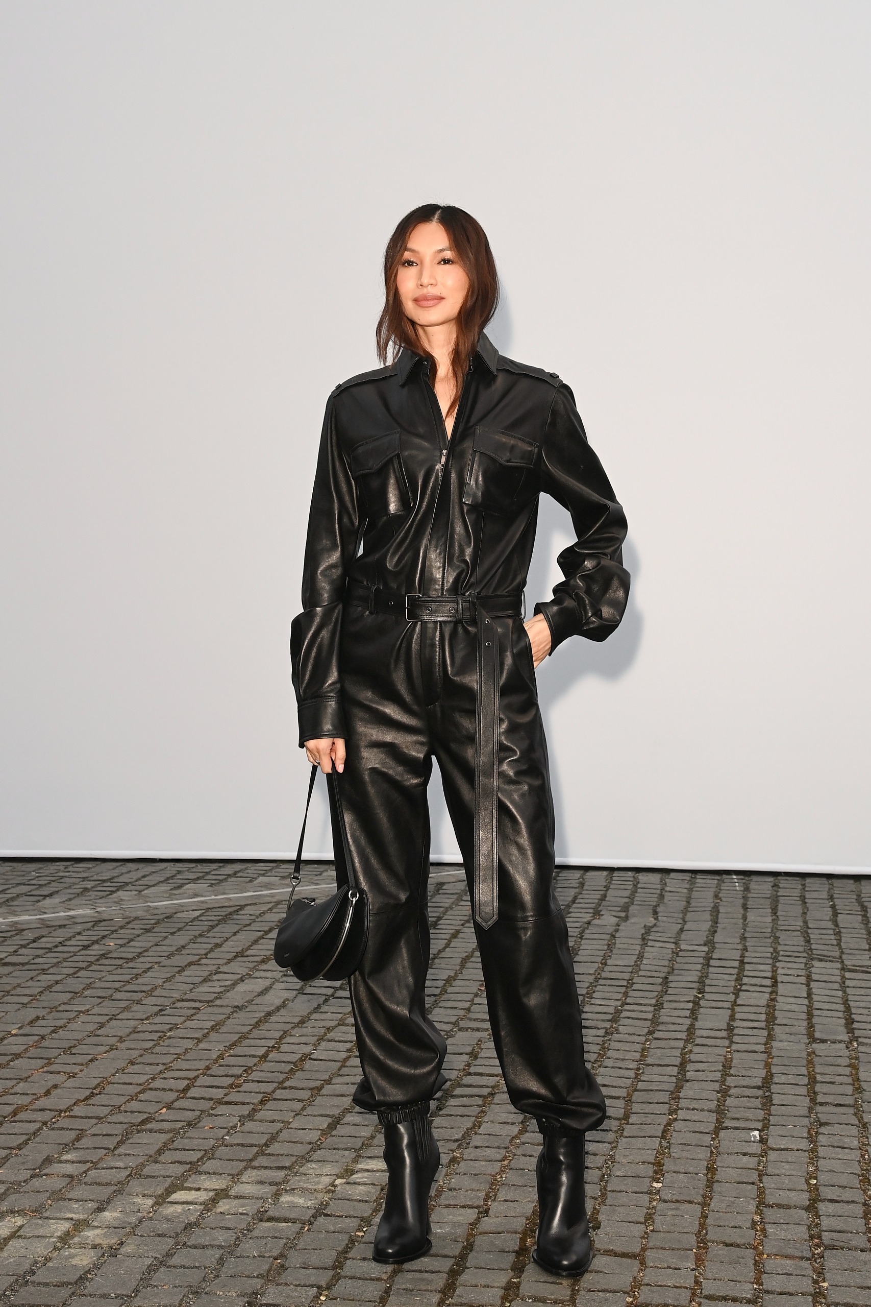 An image of celebrities arriving at the Burberry front row.