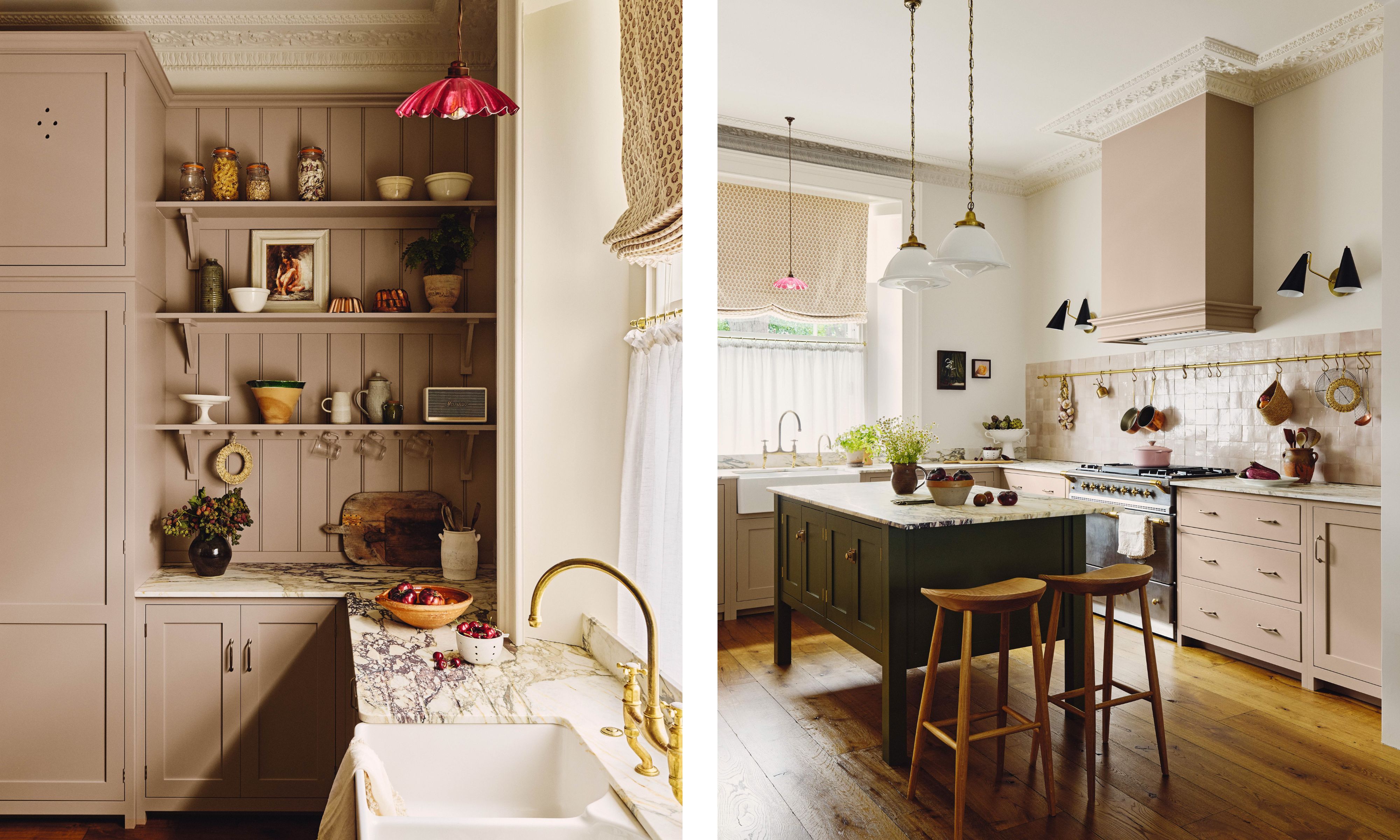 A split image of two angles of the same pink kitchen. On the left, open kitchen shelves displaying ceramics and food jars, and a marble countertop A pink glass pendant light hangs above. On the right, a pale pink with a green island, with brass fixtures and a wooden floor.