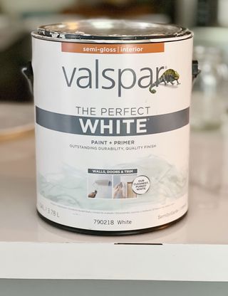 Valspar white interiors paint can in a bathroom