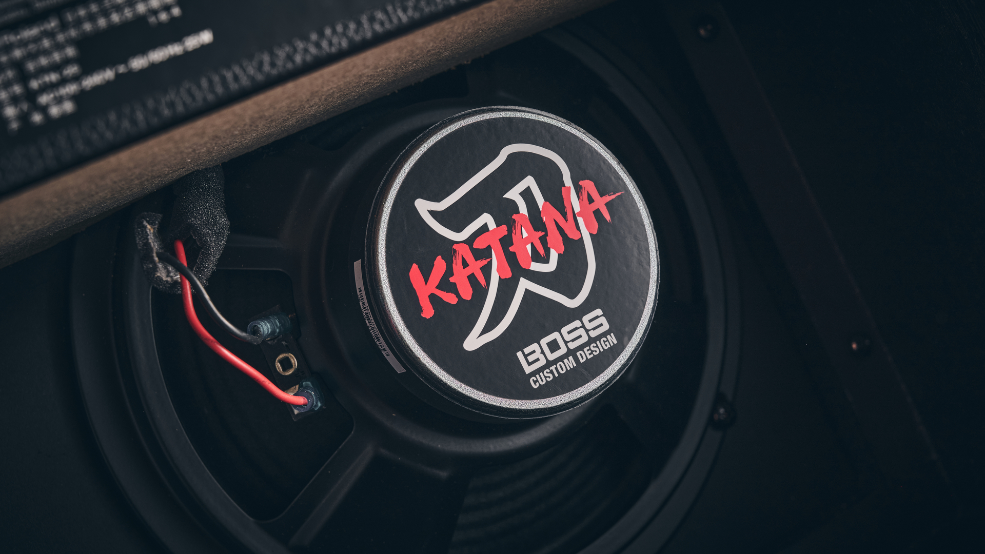 Close up of the speaker in the open cabinet of the Boss Katana-25
