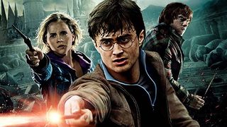 Harry Potter (Daniel Radcliffe) waves his wand in Harry Potter and The Deathly Hallows Part 2