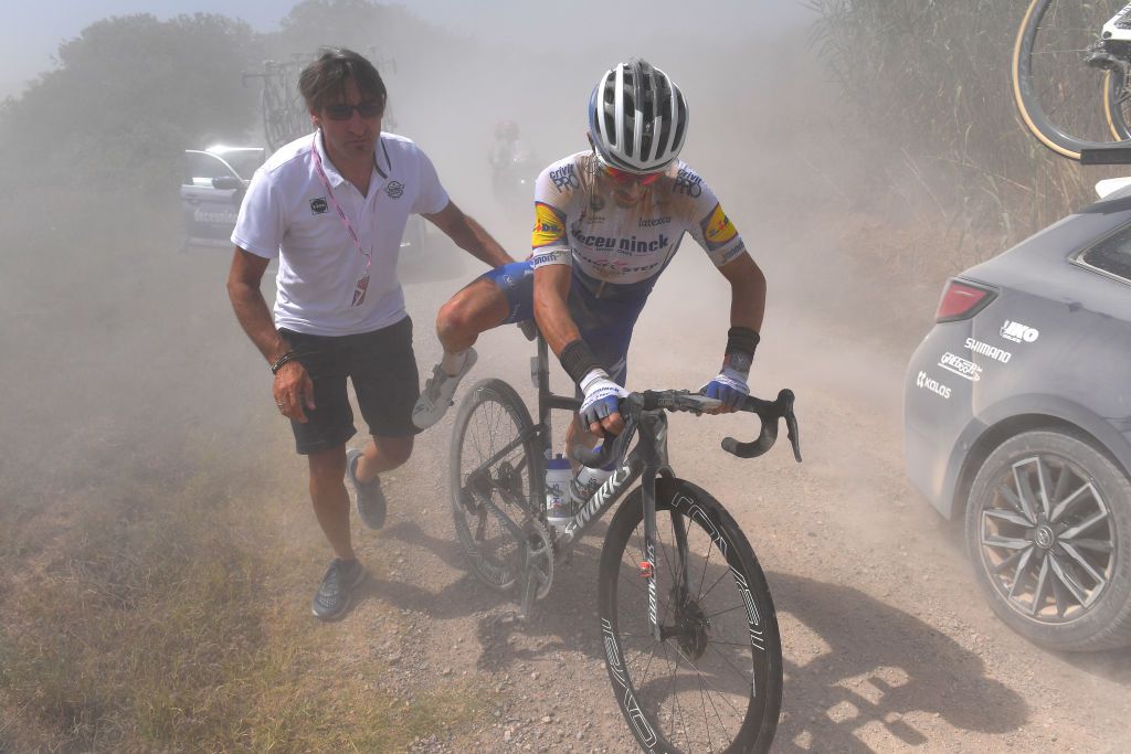 SIENA ITALY AUGUST 01 Davide Bramati of Italy Sports Director of Deceuninck QuickStep Julian Alaphilippe of France and Team Deceuninck QuickStep Mechanical Problem during the Eroica 14th Strade Bianche 2020 Men a 184km race from Siena to SienaPiazza del Campo StradeBianche on August 01 2020 in Siena Italy Photo by Tim de WaeleGetty Images