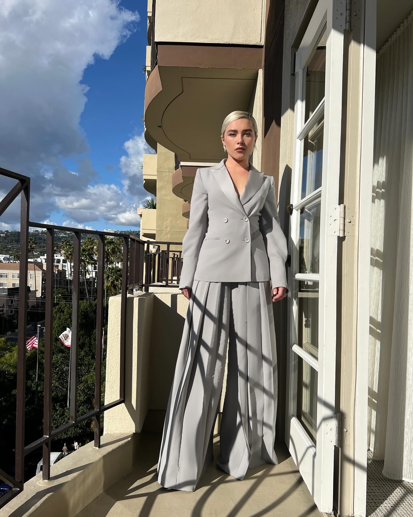 florence pugh wearing wide-leg pants
