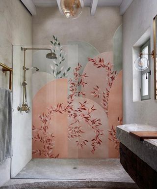 A bathroom idea using pink and grey waterproof wallpaper with floral design