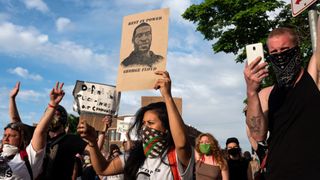 'i can't breathe' protest held after man dies in police custody in minneapolis