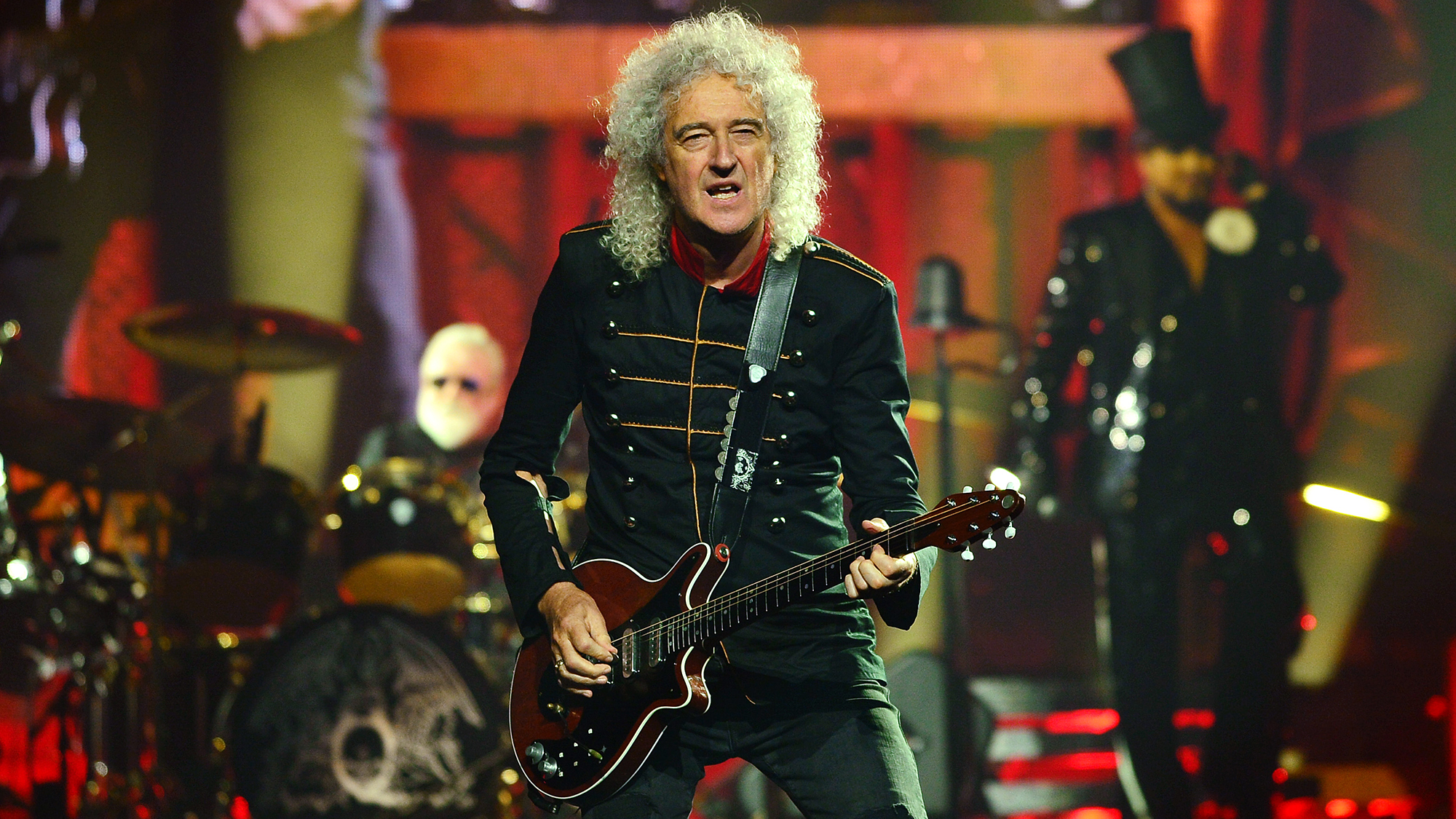 Adam Lambert performs on stage with Brian May and Roger Taylor of Queen, during the Rhapsody tour, at The O2 Arena on June 05, 2022 in London