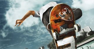 Skate 4 - a skateboarder from underneath as he goes down a halfpipe