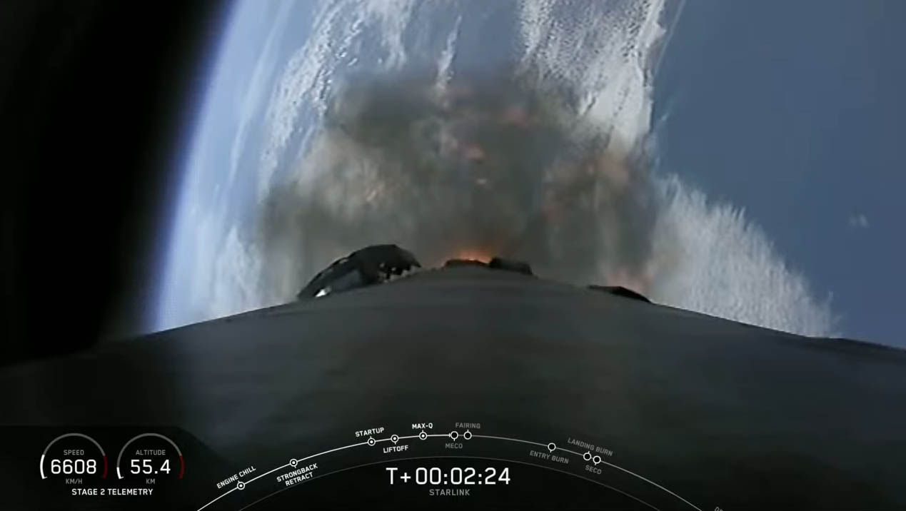 SpaceX's Falcon 9 rocket soars into space, with the Earth a brilliant blue in the background in this view from the first stage booster that launched 60 Starlink internet satellites into orbit on Feb. 17, 2020.