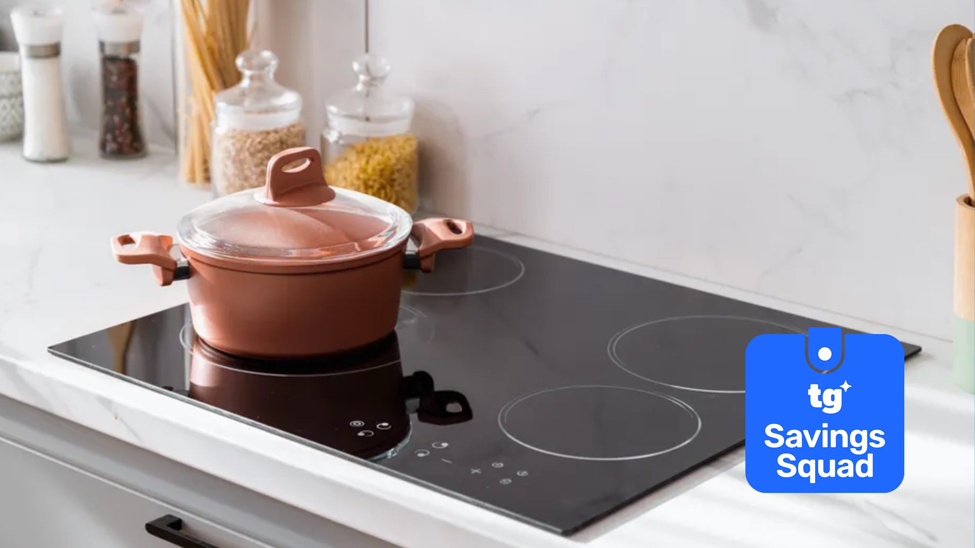 Induction cooktop with pot with Tom's Guide savings squad logo