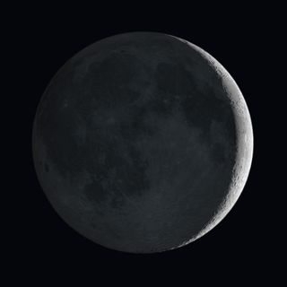 Artists’s impression of the moon showing earthshine 