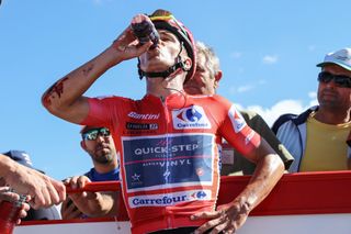 Quick Step rider downs a ketone drink