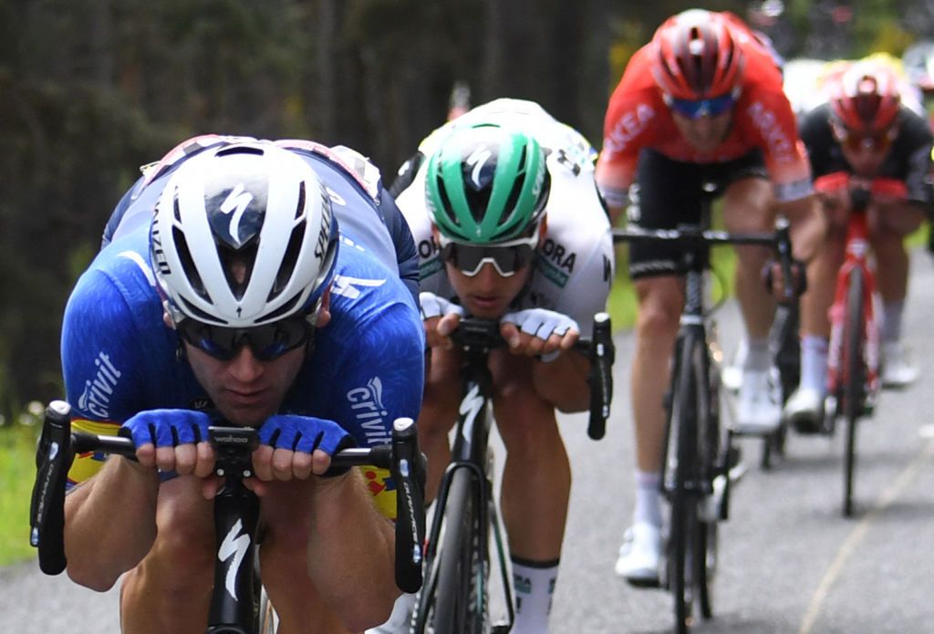 Riders carefully avoid the banned super tuck position