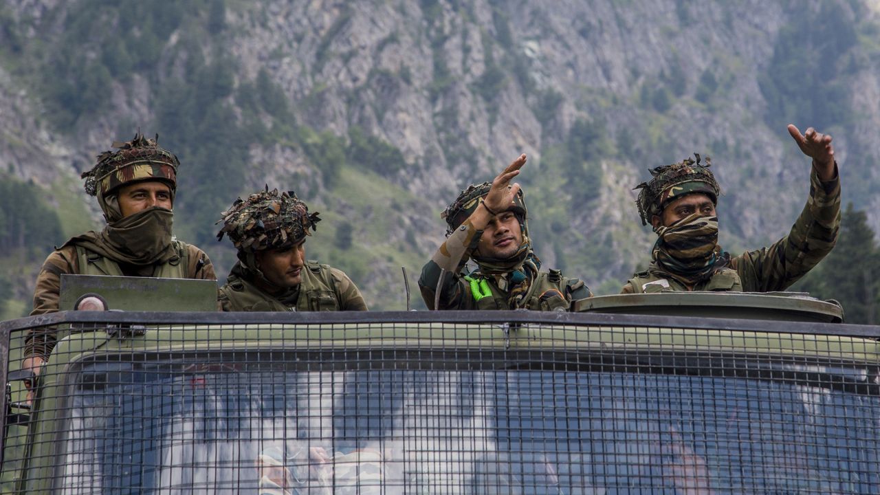 Indian army convoy carrying reinforcements and supplies drives towards a highway bordering China