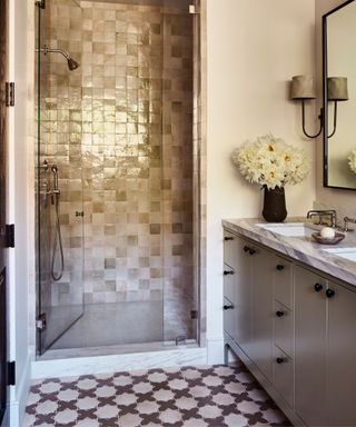 rustic bathroom with handmade floor tiles and zellige shower wall tiles
