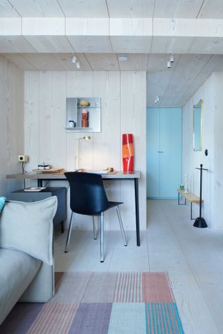 Desk area within living space at Luca Nichetto Pink House