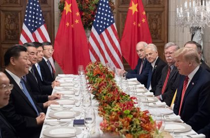 Trump and Xi Jinping at a table in Buenos Aires