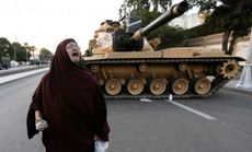 An Egyptian protester chants slogans against President Morsi outside the presidential palace in Cairo on Dec. 18.