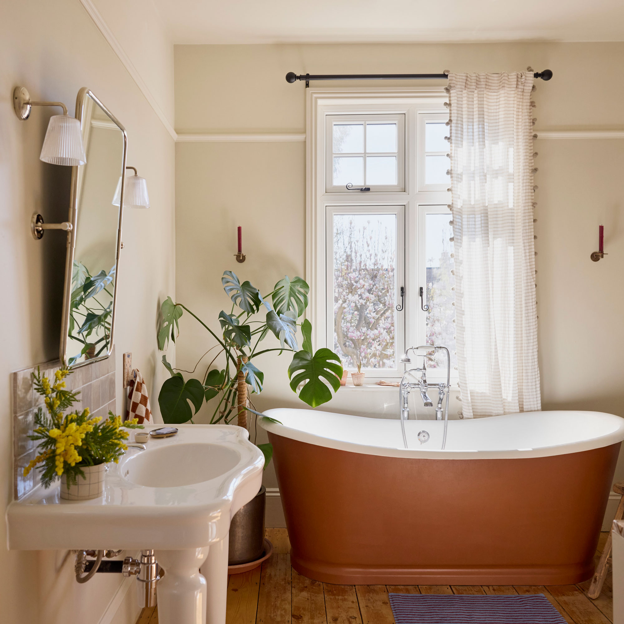 White bathroom with voile curtain copper tub and white pedestal